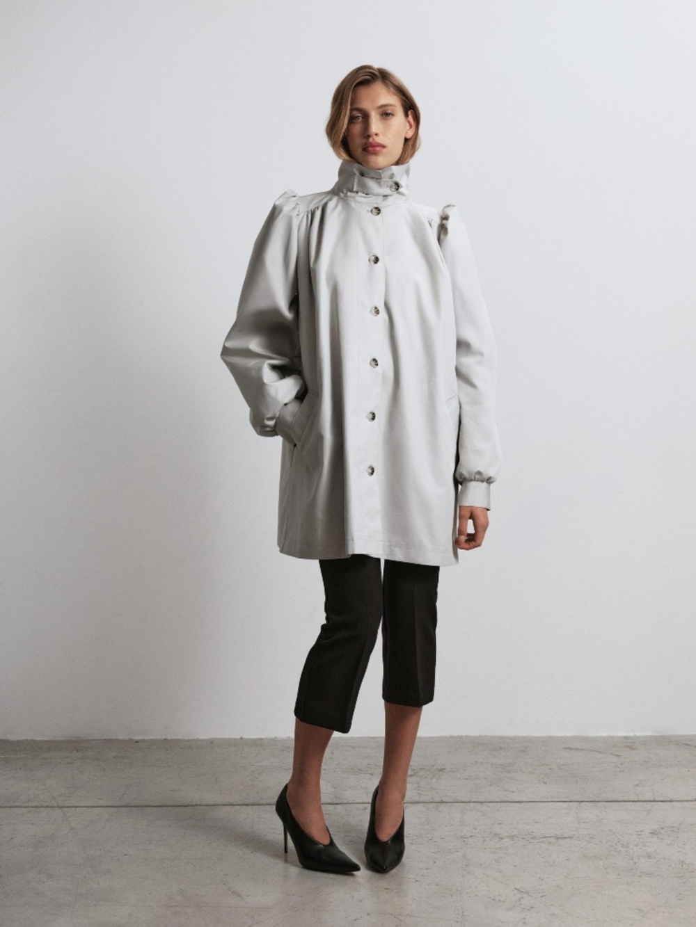 Raincoat with stole and accent lining